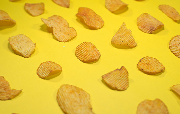 potato chips on a yellow background