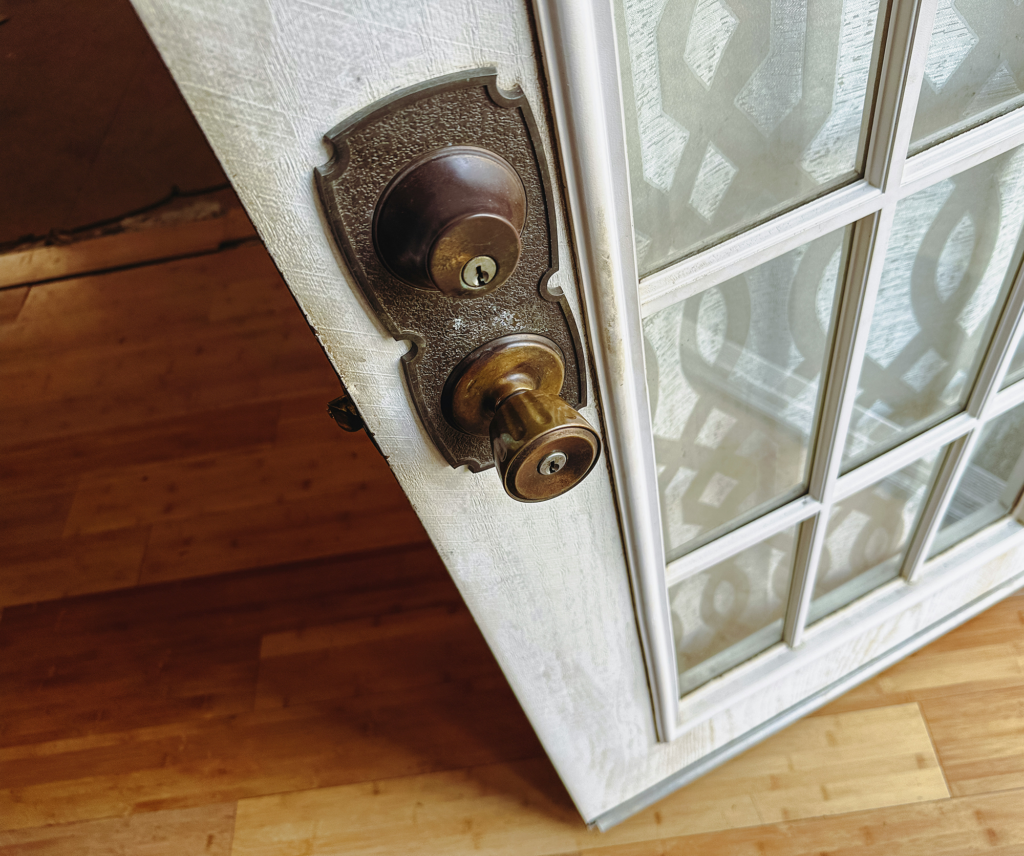 Close-up of Open Antique French Glass Door